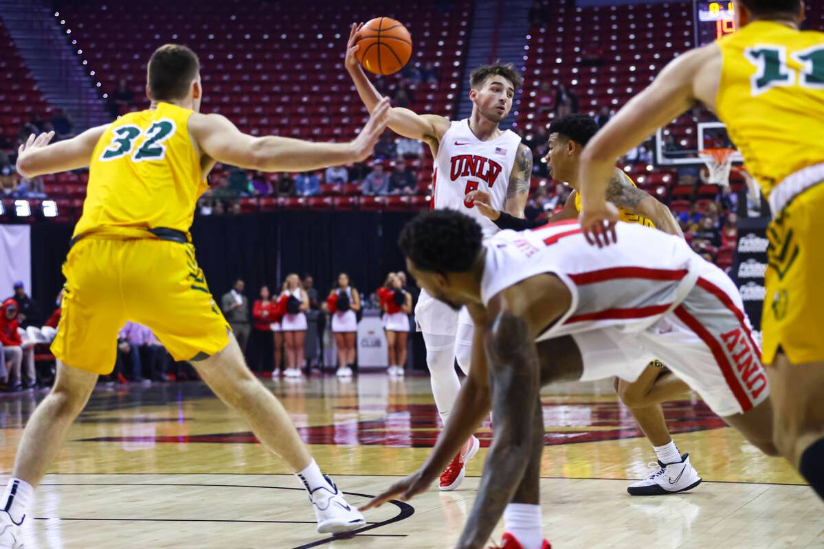 UNLV Rebels guard Jordan McCabe (5) looks to pass the ball during the first half of an NCAA bas ...