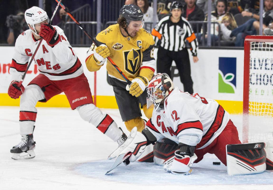 Golden Knights right wing Mark Stone (61) shoots on Carolina Hurricanes goaltender Antti Raanta ...