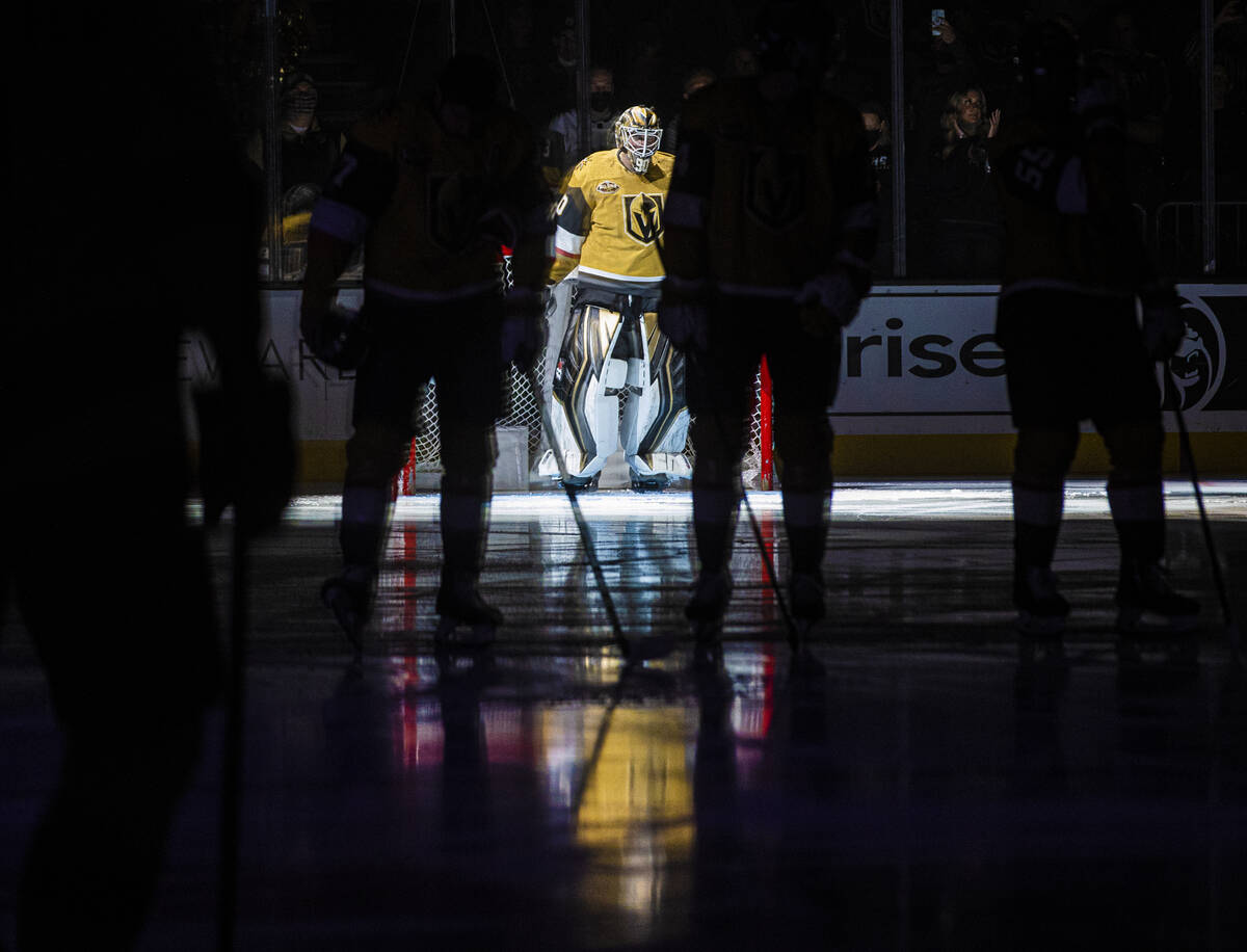 Golden Knights goaltender Robin Lehner (90) is announced before the start of an NHL hockey game ...