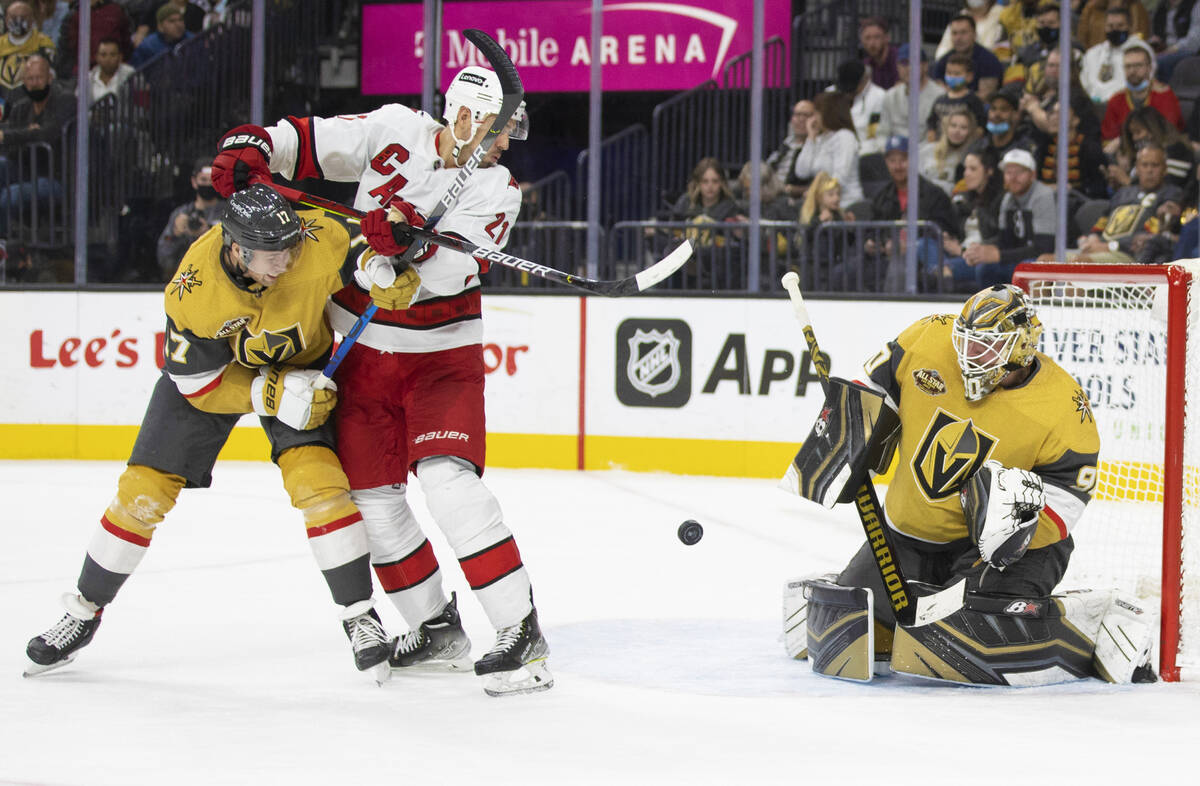 Golden Knights goaltender Robin Lehner (90) makes a save against Carolina Hurricanes right wing ...