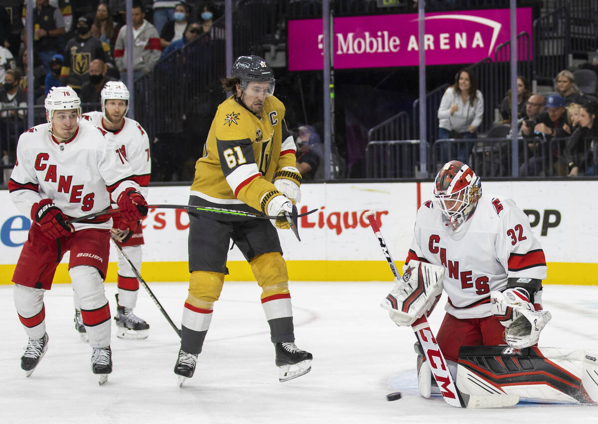 Golden Knights right wing Mark Stone (61) shoots on Carolina Hurricanes goaltender Antti Raanta ...