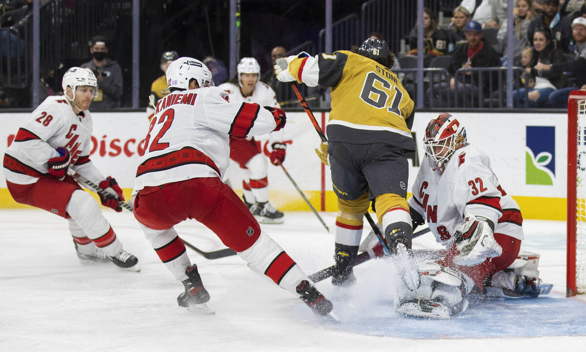 Carolina Hurricanes goaltender Antti Raanta (32) makes a save against Golden Knights right wing ...