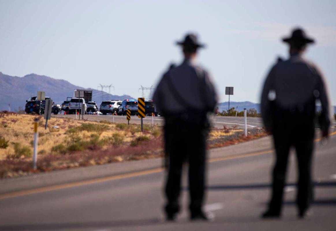 Nevada Highway Patrol troopers respond to the scene of a crash that left at least five bicyclis ...