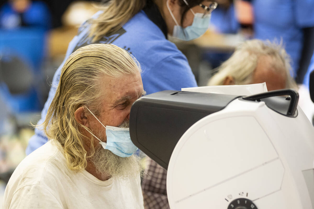 Participate Danny Geisler receives an eyes screening during the annual Project Homeless Connect ...