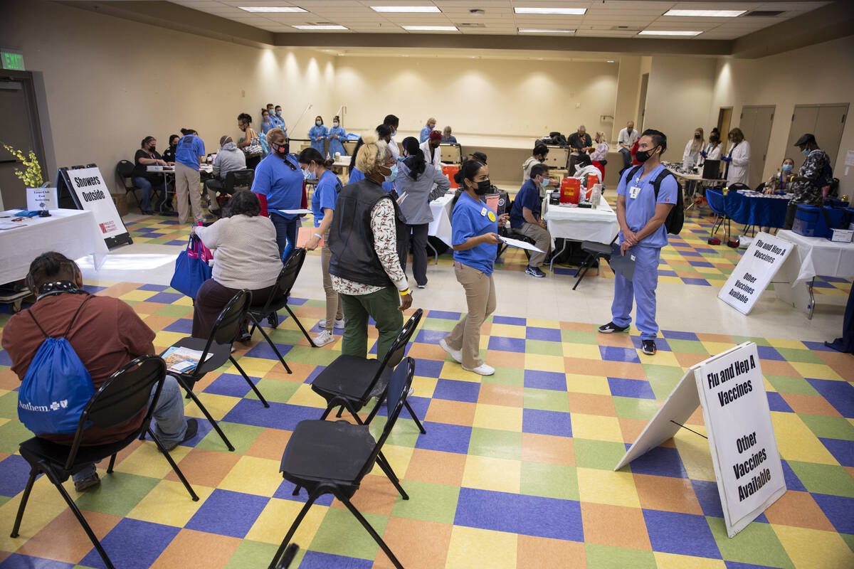 People participate during the annual Project Homeless Connect at Pearson Community Center in No ...