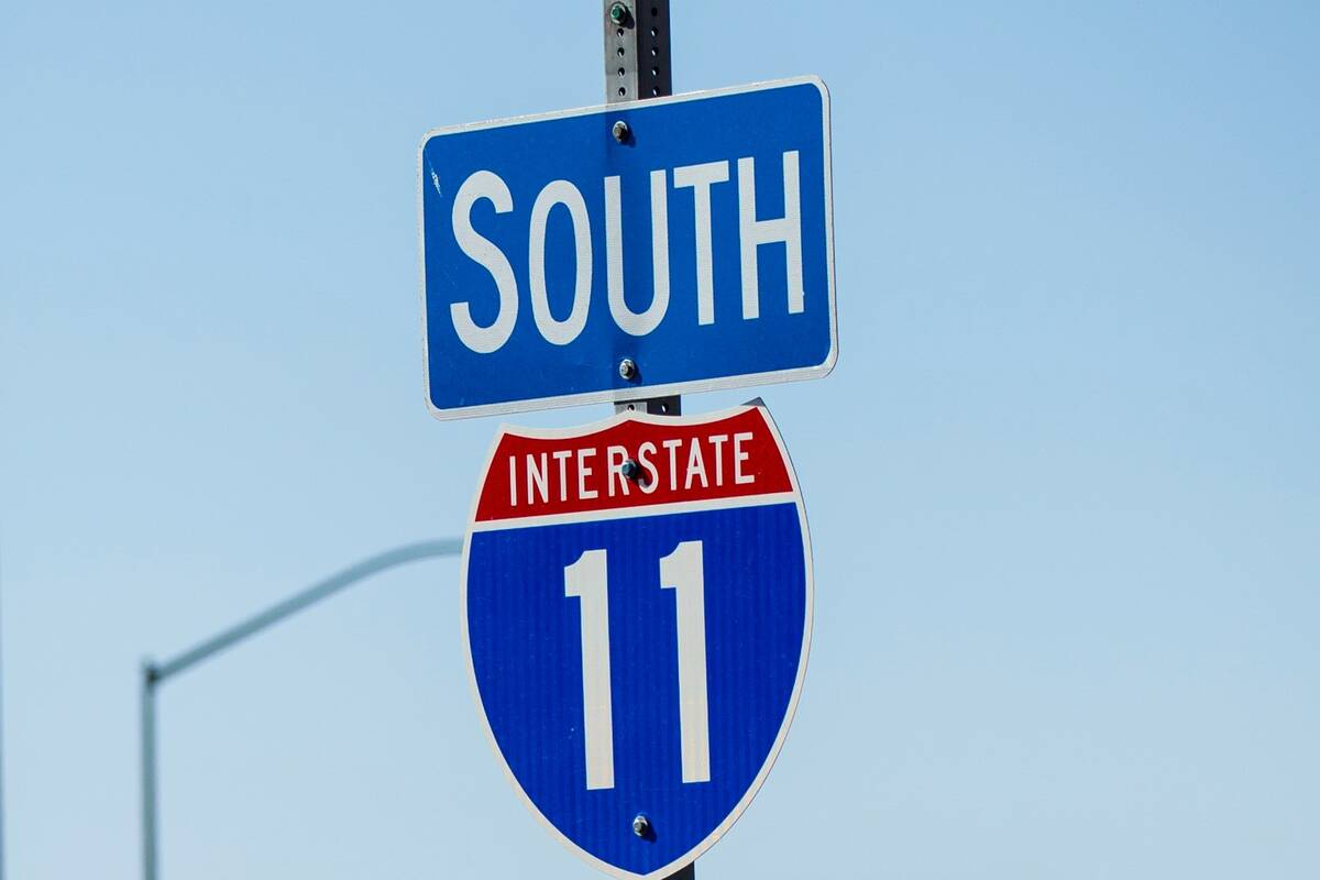 Signage for Interstate 11 at College Drive in Henderson. (Chase Stevens/Las Vegas Review-Journal)