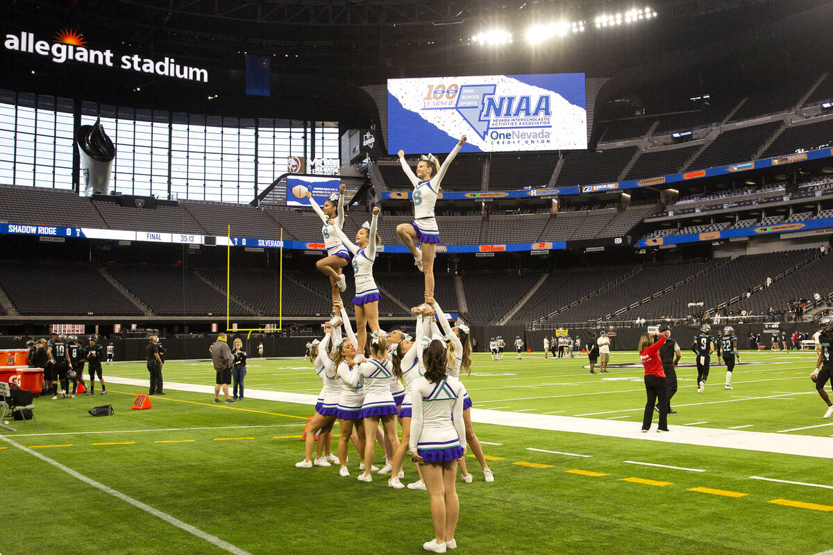 Silverado cheerleaders warm up before the Class 4A football state championship game against Sha ...