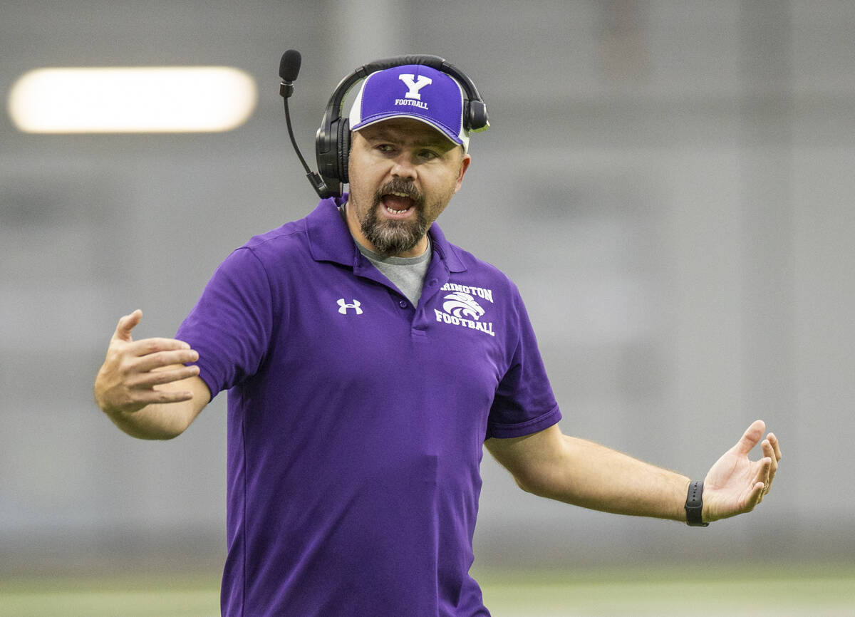 Yerington head coach Brad Pope argues a penalty versus The Meadows during the second half of th ...