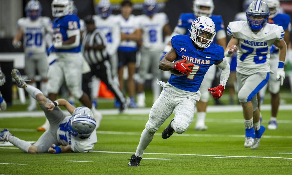 Bishop Gorman wide receiver Zachariah Branch (1) cuts into the open for another score over McQu ...