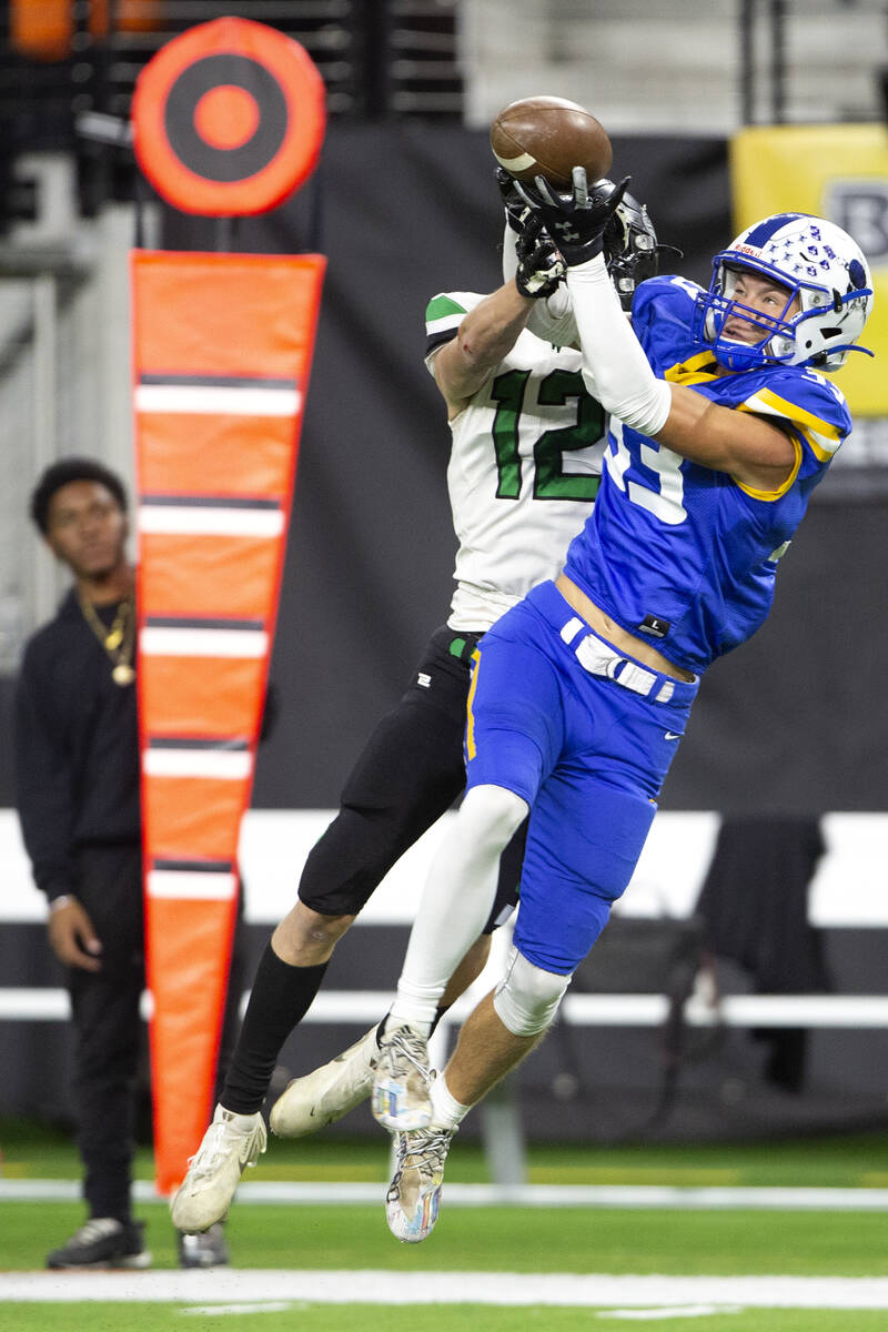 Moapa Valley wide receiver Cj Anderson (33) misses a touchdown catch as Virgin Valley strong sa ...