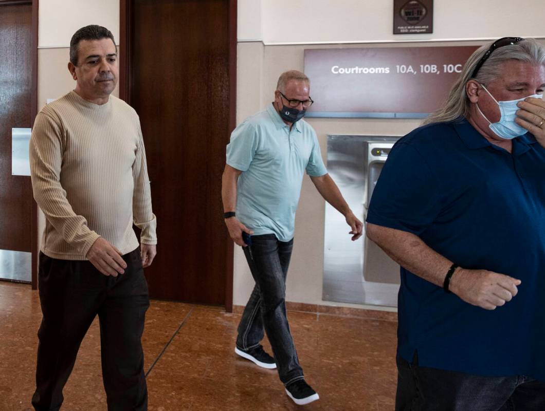 Lonny Weissman, left, the husband of Michelle Weissman, 56, a bicyclist who died after she was ...