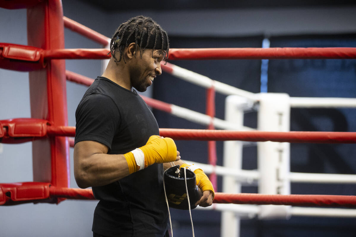 Shawn Porter gets ready to workout on the ring in preparation for an upcoming fight, at the Rea ...