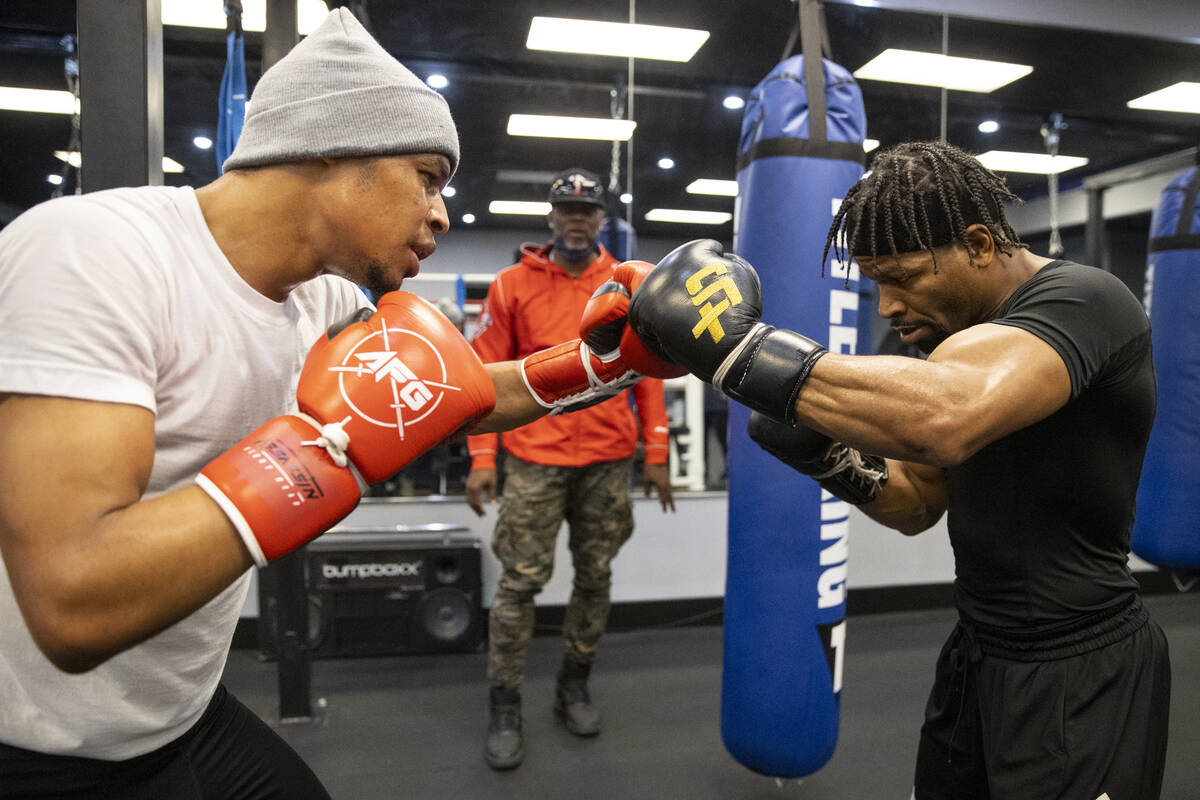 Shawn Porter, right, trains with Hendri Cedeño in preparation for an upcoming fight, at th ...
