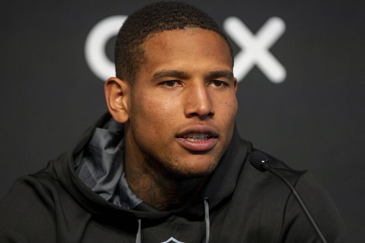 Raiders tight end Darren Waller answers questions during a news conference at Raiders headquart ...