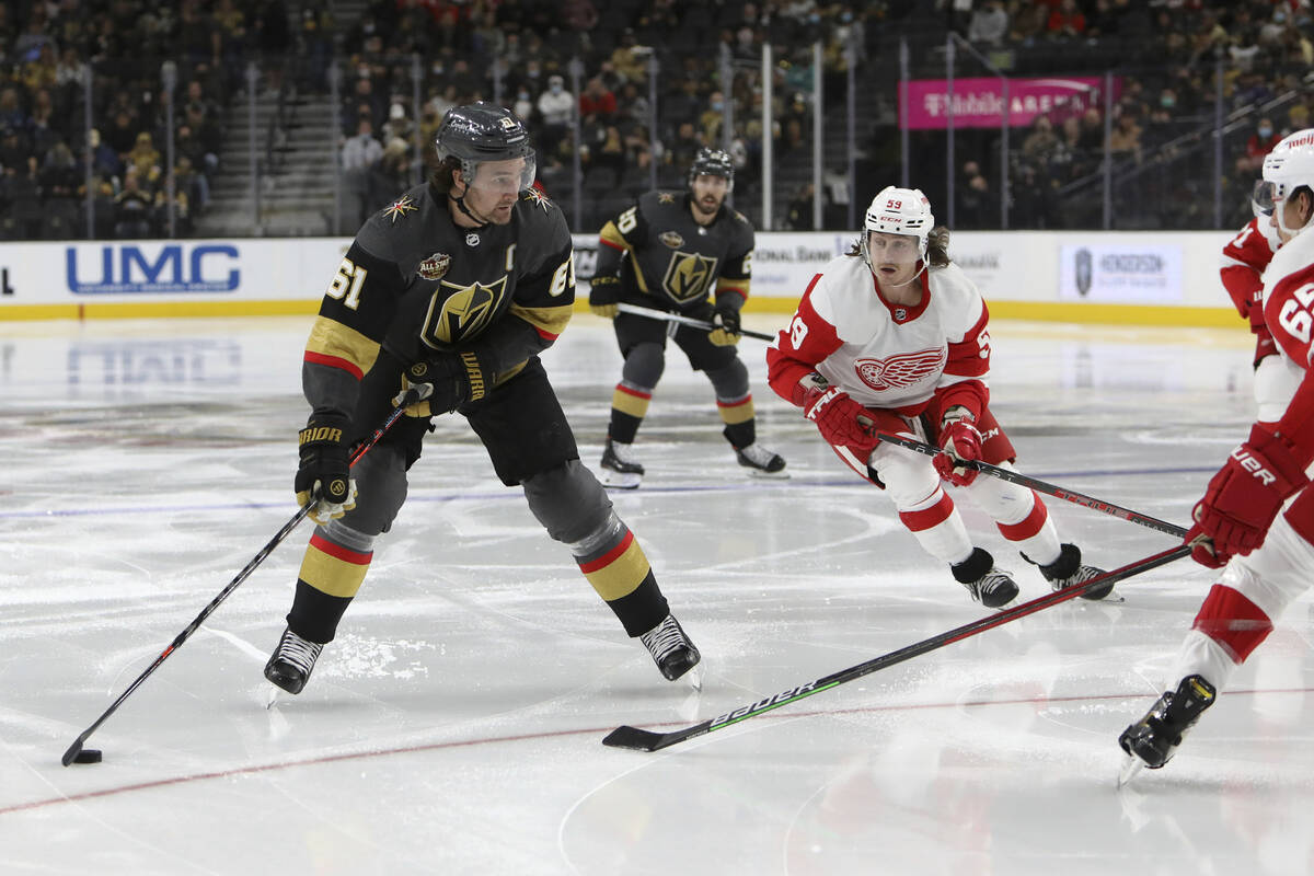 Vegas Golden Knights right wing Mark Stone (61) looks for the open pass against the Detroit Red ...