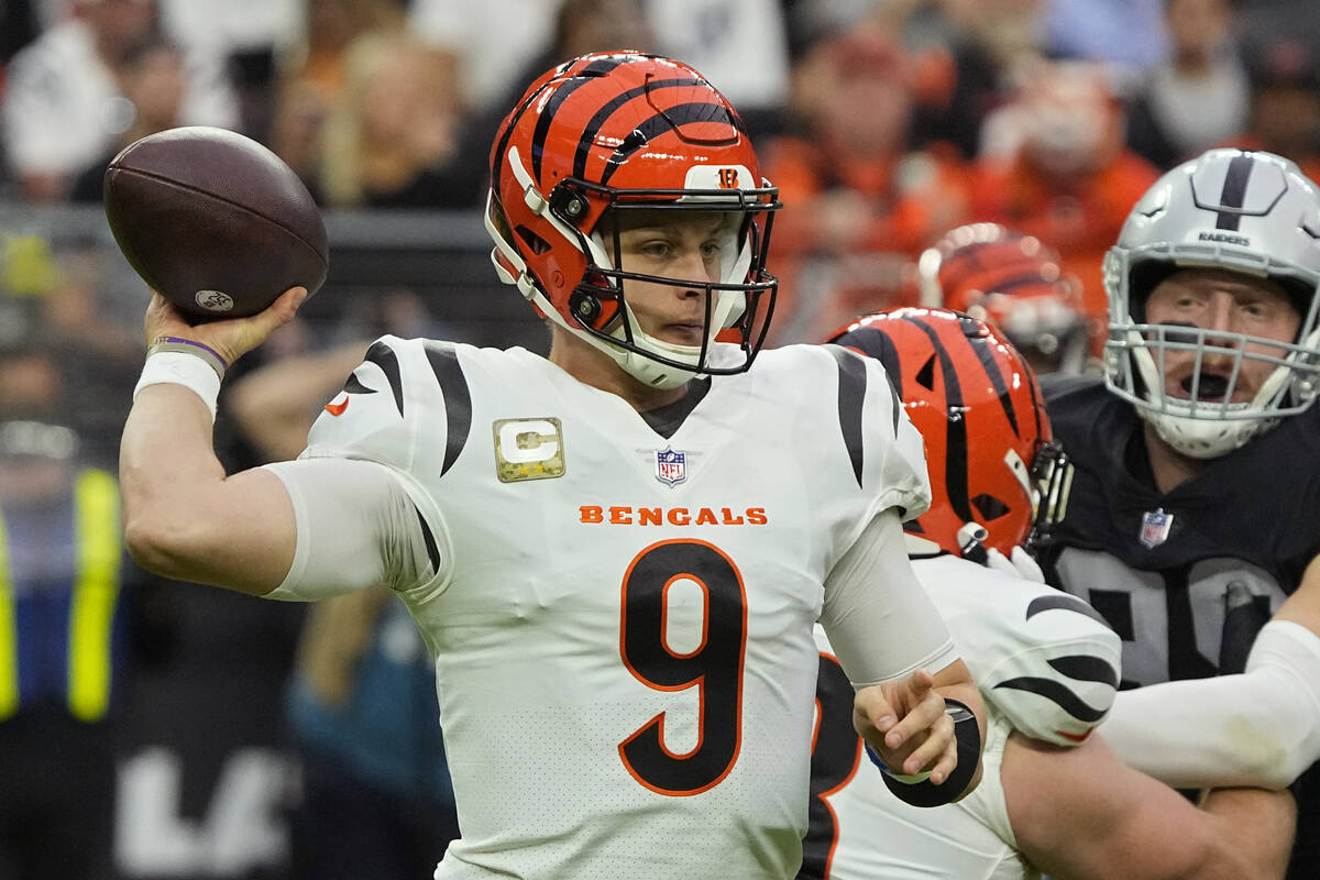 Cincinnati Bengals quarterback Joe Burrow (9) throws against the Las Vegas Raiders during the f ...