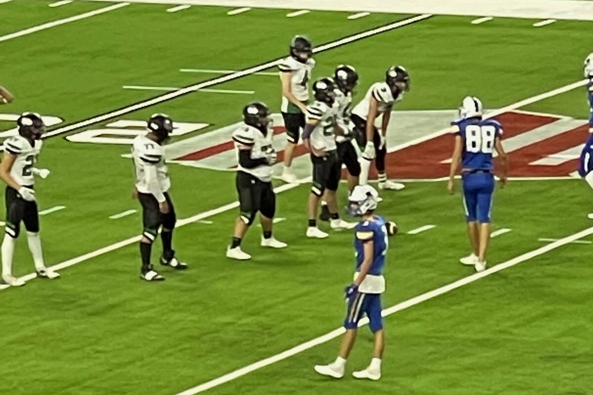 Female football player Ana Tausinga (white jersey, third from left), a sophomore at Virgin Vall ...