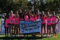 Desert Oasis celebrates after winning the Class 4A girls state cross country championship at Ve ...