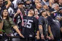 Raiders fans are dejected after another Kansas City Chiefs score during the second half of an N ...
