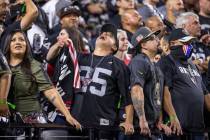 Raiders fans are dejected after another Kansas City Chiefs score during the second half of an N ...