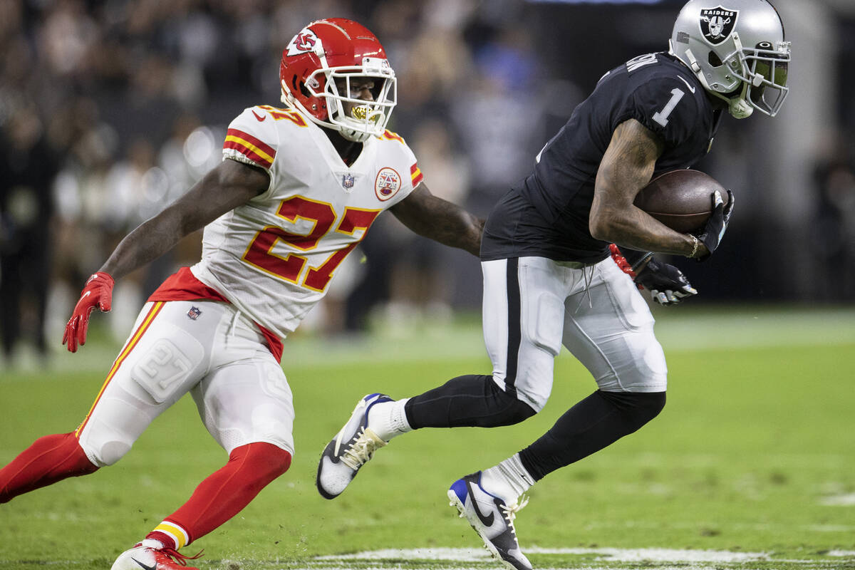 Raiders wide receiver DeSean Jackson (1) makes a catch past Kansas City Chiefs defensive back R ...