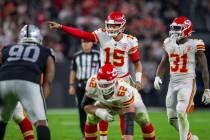 Kansas City Chiefs quarterback Patrick Mahomes (15) audibles at the line of scrimmage during th ...