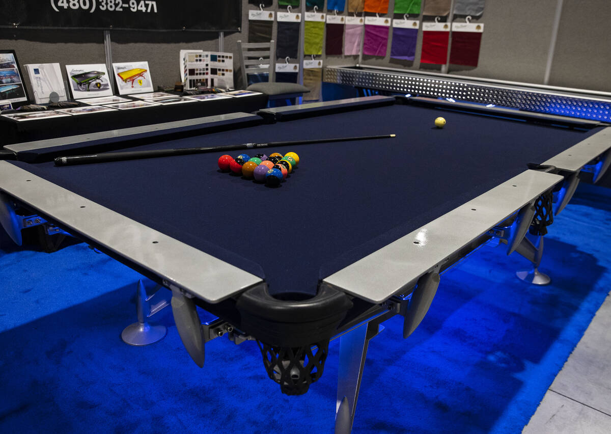 A professional pool table made by Martin Bauer Billiards is displayed at Big Boys Toys, the wor ...