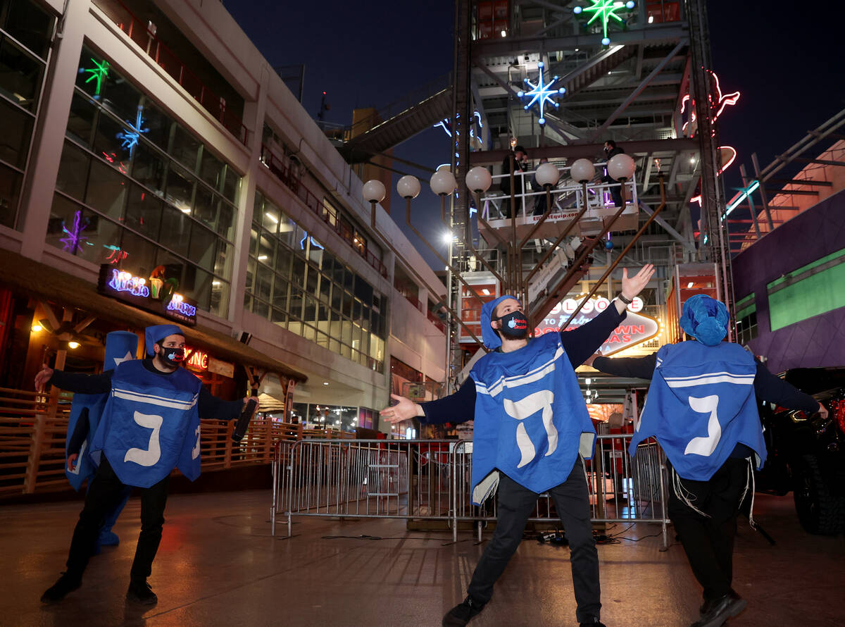 Members of the Dancing Dreidels, including Shaul Rimler of Phoenix, left, and Mendy Piekarski o ...