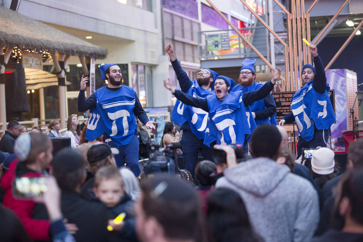 The Dancing Dreidels perform at a menorah lighting hosted by the Chabada of Southern Nevada for ...