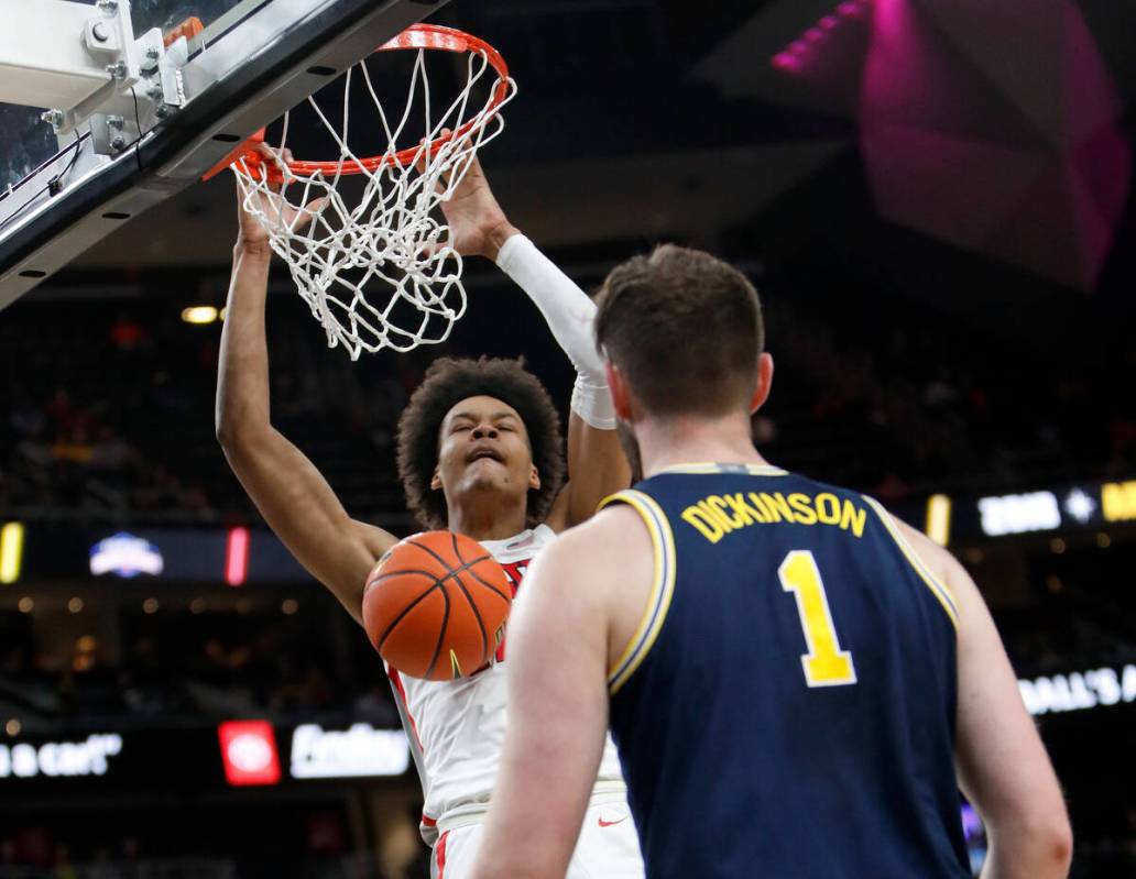 UNLV Rebels center David Muoka (12) dunks during the first half of a Roman Main Event first rou ...