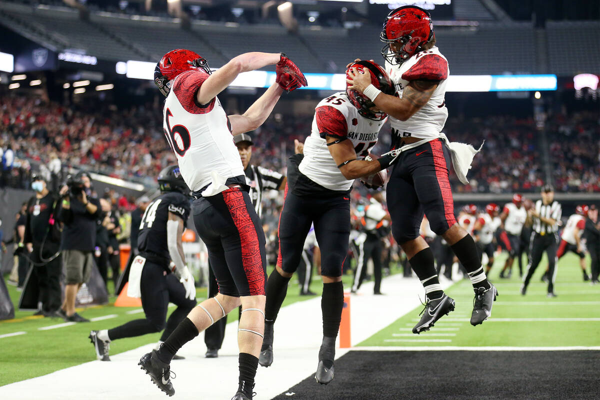San Diego State Aztecs wide receiver Jesse Matthews celebrates a touchdown with wide receiver E ...