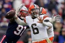 New England Patriots defensive end Deatrich Wise (91) pounces on Cleveland Browns quarterback B ...