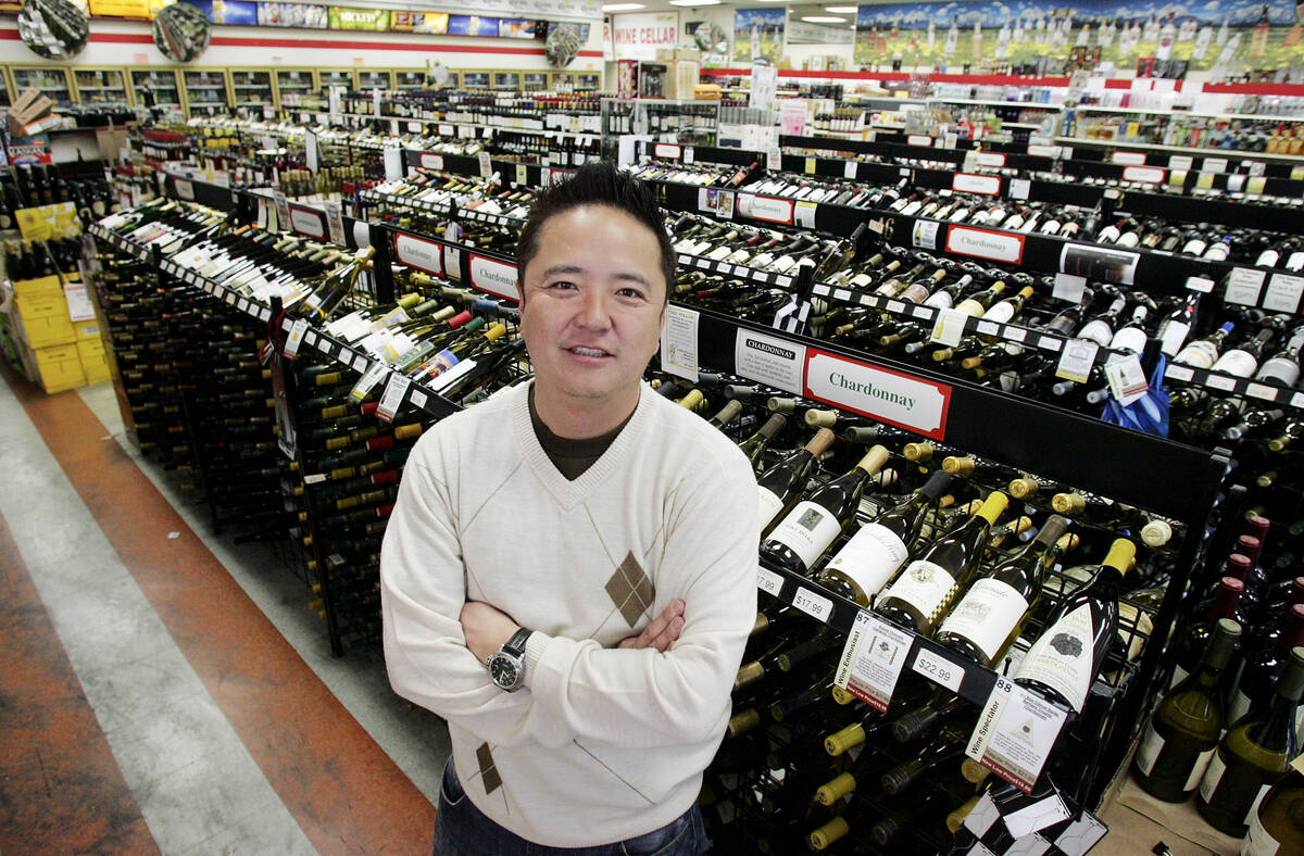 Lee's Discount Liquor owner Kenny Lee stands in one of his store at 1780 S. Rainbow Blvd., on M ...