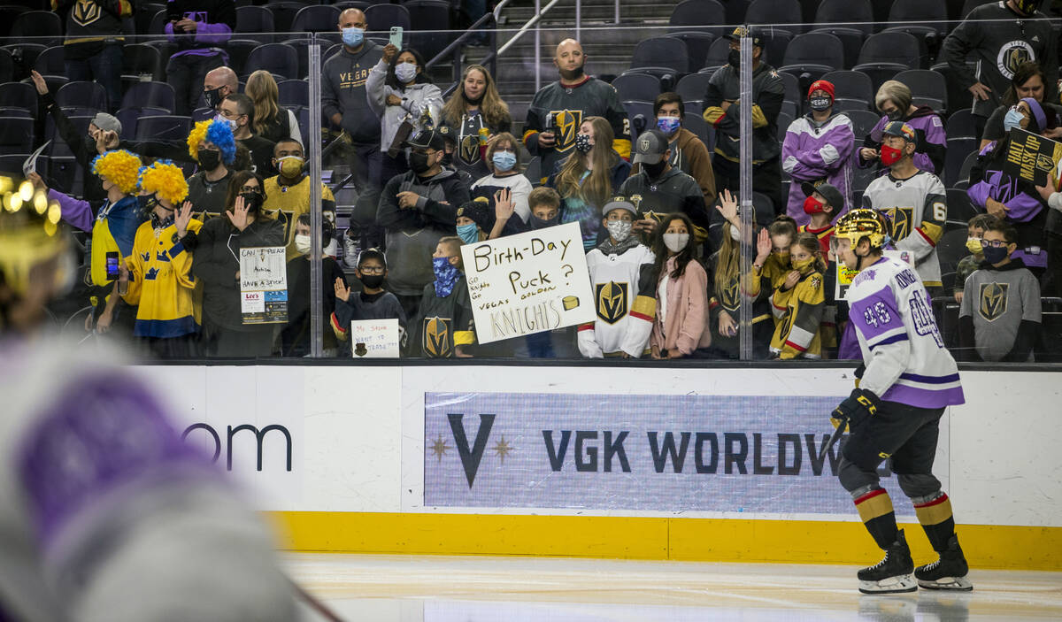Golden Knights fans watch and cheer during warm up before the first period of an NHL game at T- ...