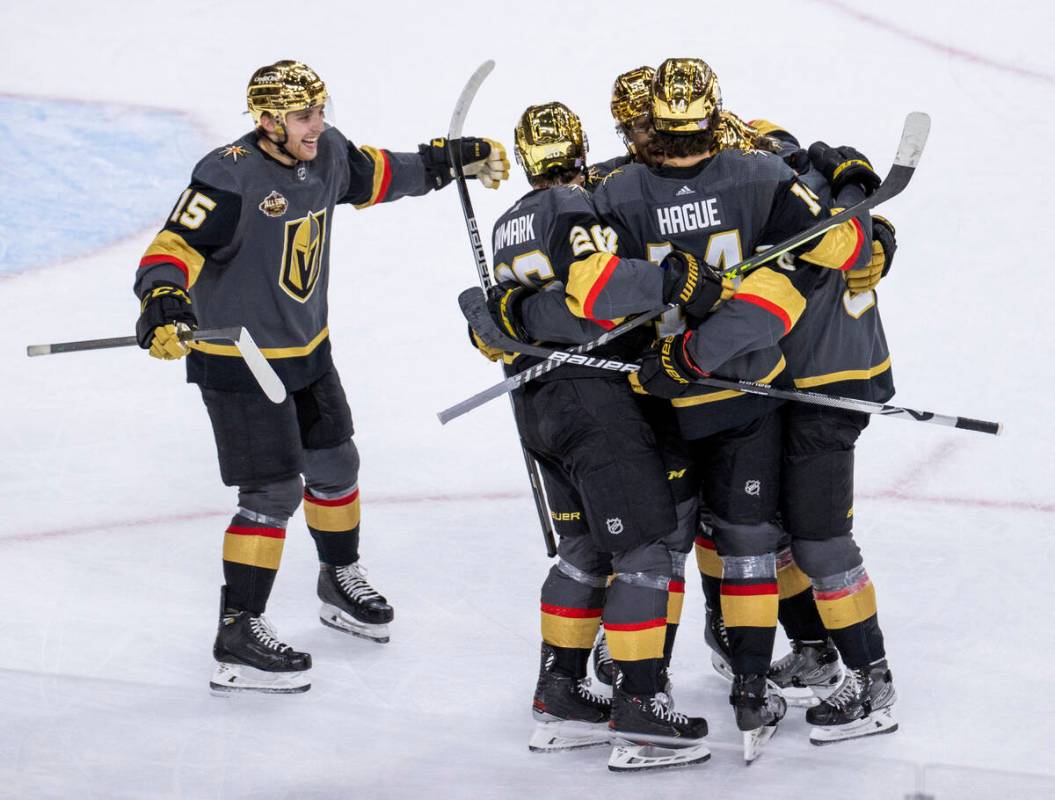 Golden Knights center Mattias Janmark (26) sends the puck into the net past Columbus Blue Jacke ...