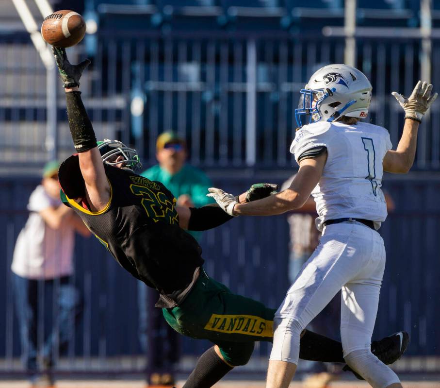 Eureka’s Danny Lee (22) dives to try and make a catch over Pahranagat Valley’s Ga ...