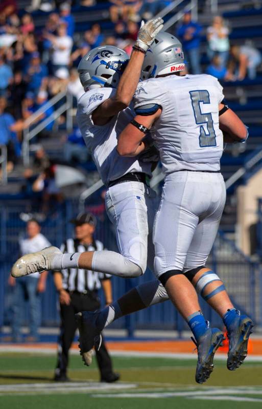 Pahranagat Valley’s Jaren Leavitt (5) celebrates after scoring a first half touchdown du ...