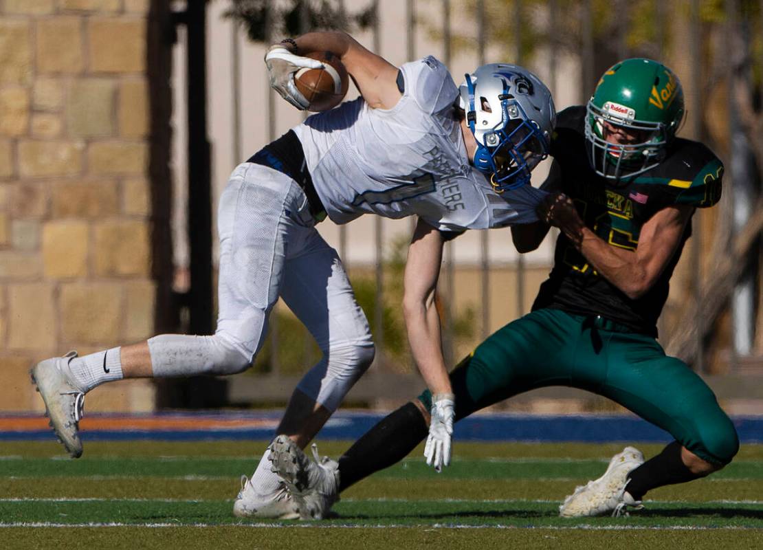 Pahranagat Valley’s Wyatt Madsen (1) makes a catch past Eureka’s Clayton Shoda (1 ...