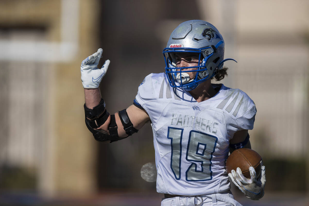 Pahranagat Valley’s Paul Lewis (19) cuts up field in the first half during the 1A high s ...