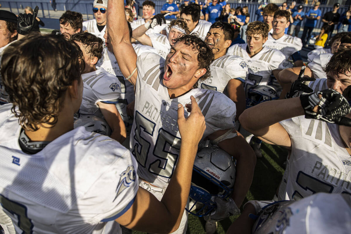 Pahranagat Valley’s Jacob Griffin (55) celebrates with teammates after beating Eureka du ...