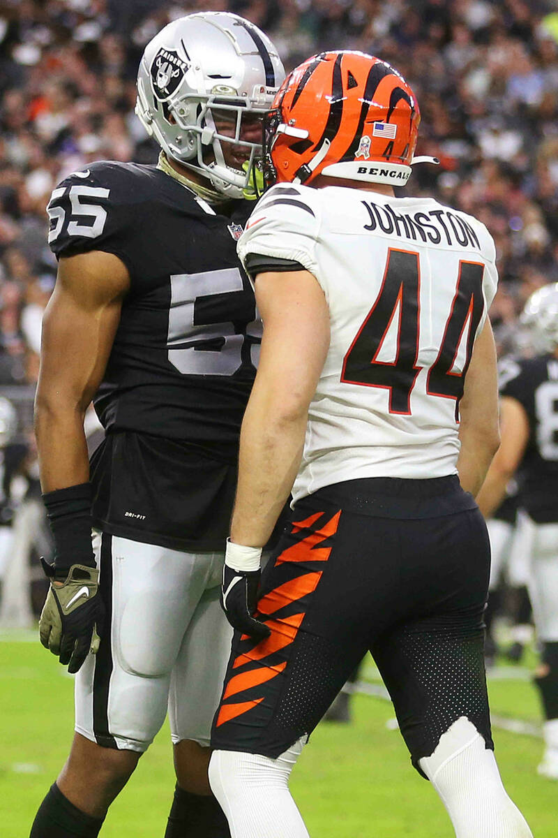 Raiders middle linebacker Marquel Lee (55) and Cincinnati Bengals linebacker Clay Johnston (44) ...