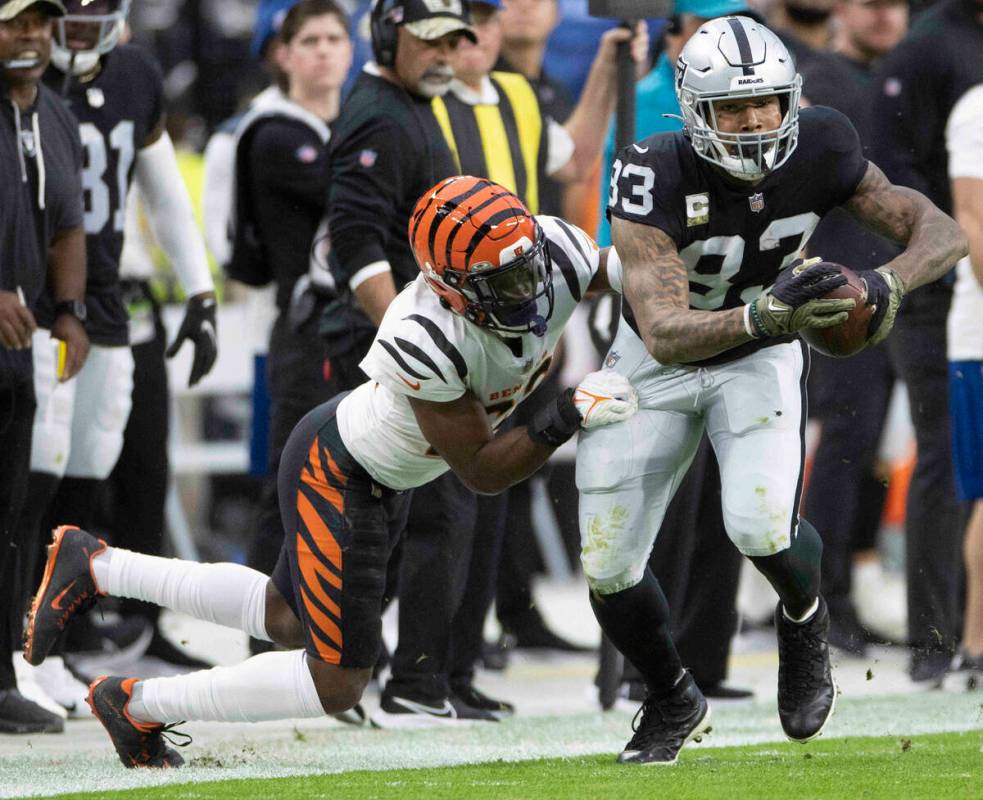 Raiders tight end Darren Waller (83) fights for extra yardage against Cincinnati Bengals corner ...