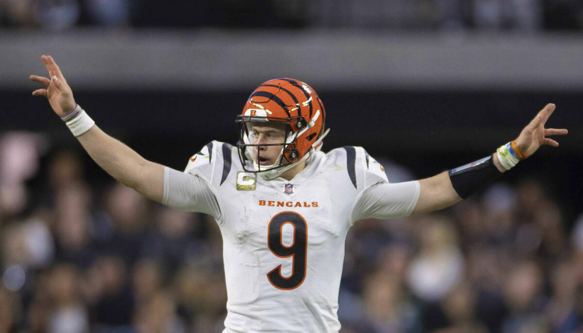 Cincinnati Bengals quarterback Joe Burrow (9) audibles in the second half during an NFL footbal ...