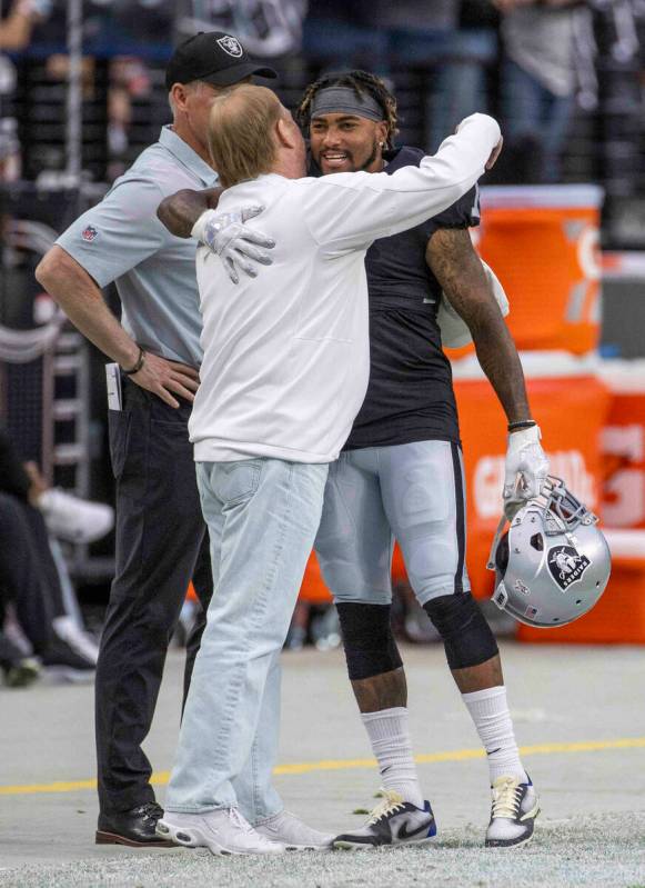 Raiders owner Mark Davis hugs Raiders wide receiver DeSean Jackson (1) as they prepare to face ...