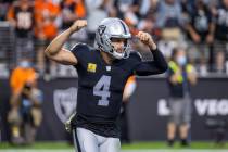 Raiders quarterback Derek Carr (4) celebrates a late touchdown closing the gap to another versu ...