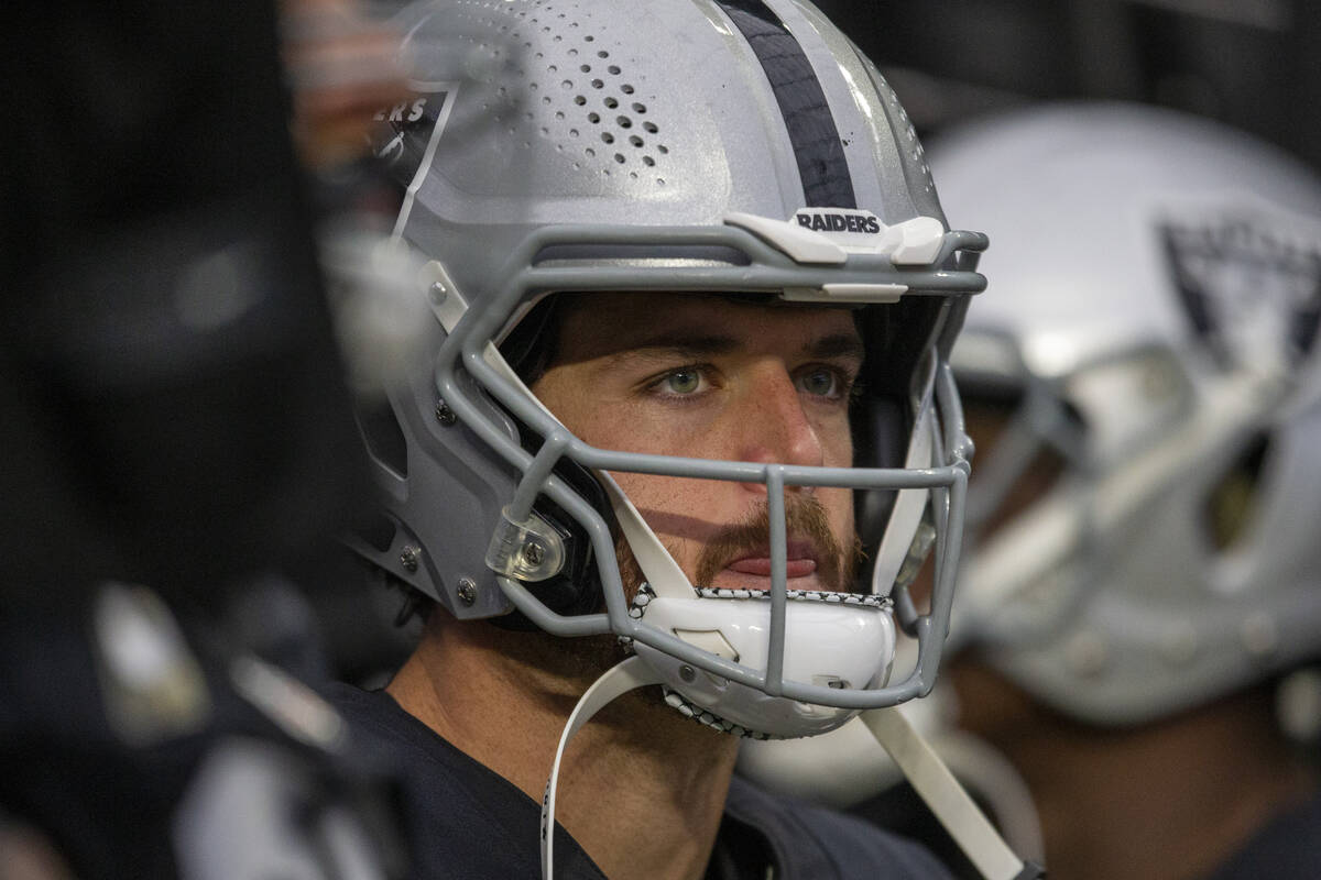 Raiders quarterback Derek Carr (4) waits in the tunnel to take the field before an NFL football ...