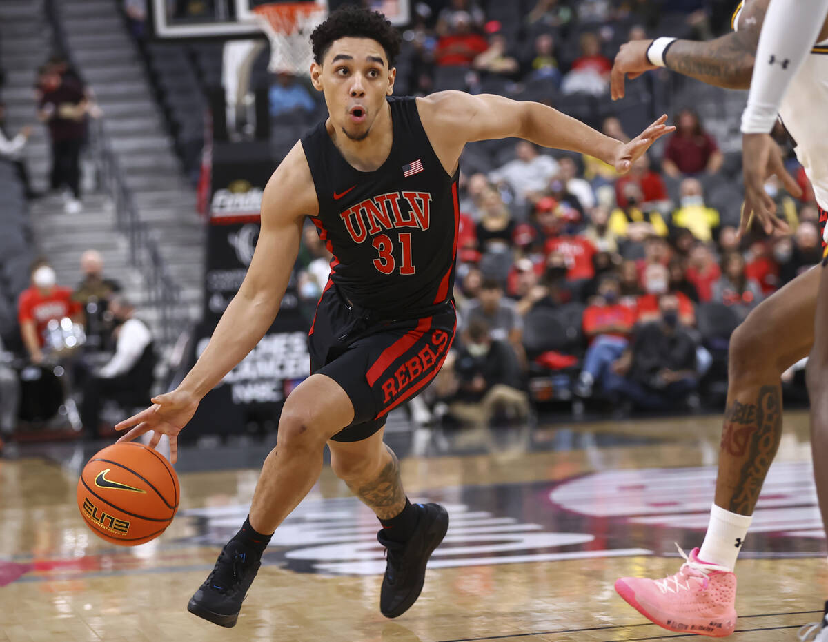 UNLV Rebels guard Marvin Coleman (31) drives to the basket against Wichita State during the fir ...