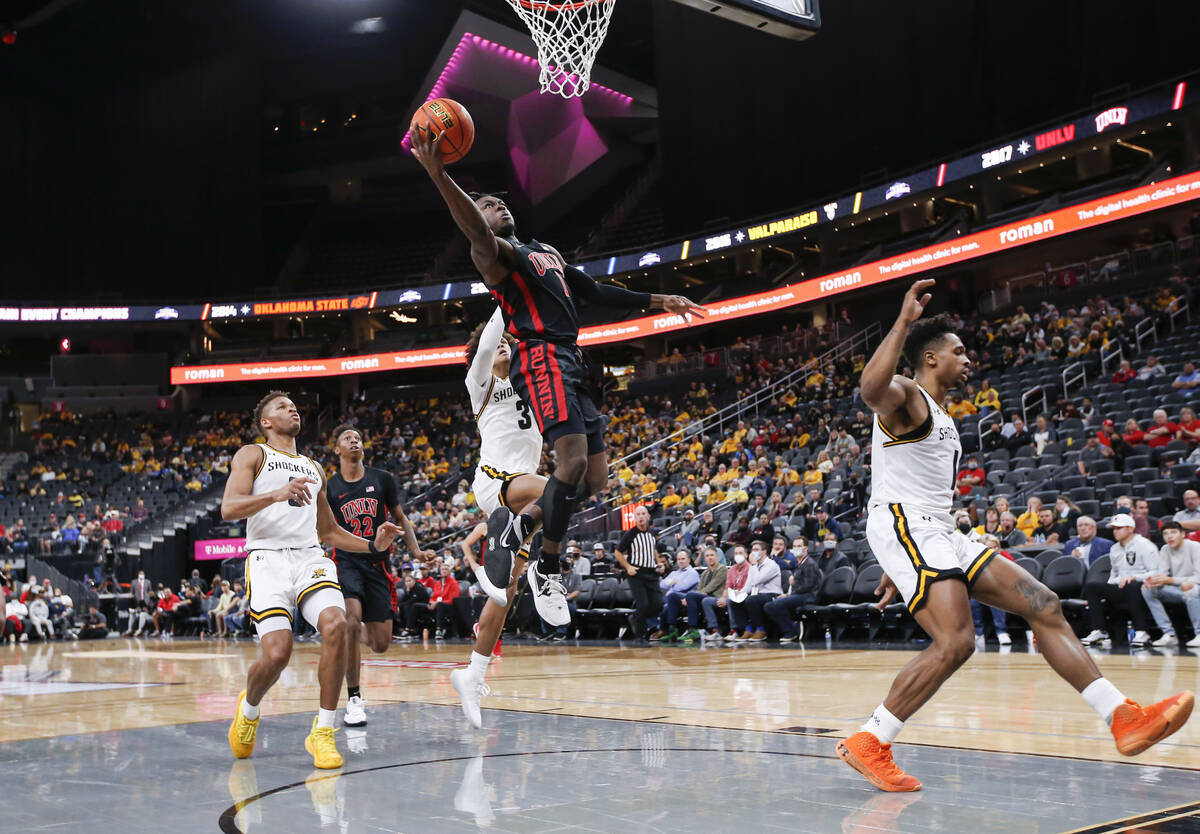 UNLV Rebels guard Michael Nuga (1) attempts a shot against Wichita State during the first half ...