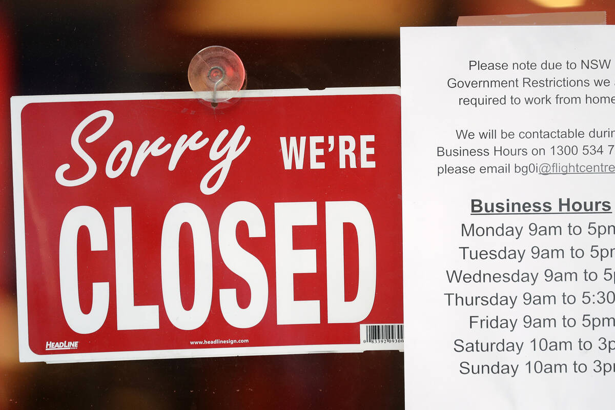 A commercial business is closed in Sydney on Aug. 13, 2021, as greater Sydney continues a weeks ...
