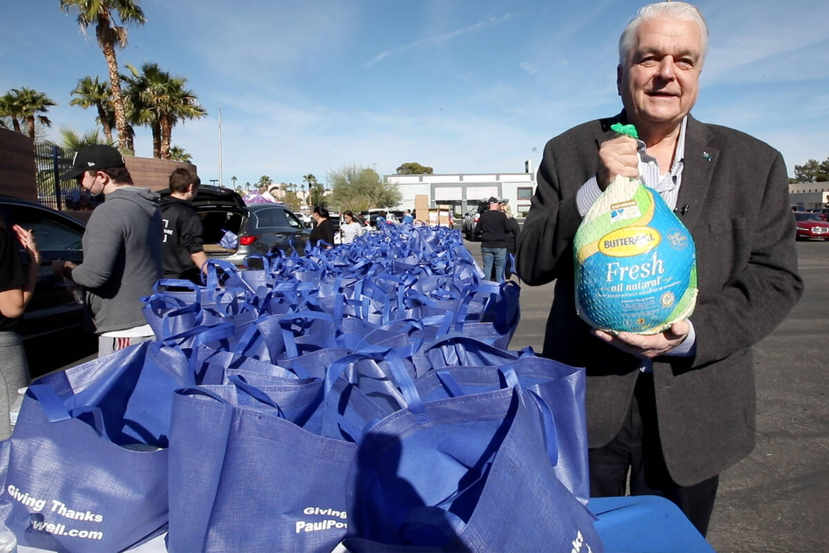 Nevada Gov. Steve Sisolak shows a turkey when he speaks to the Review-Journal during Paul Powel ...
